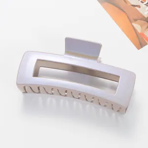 Detailed macro view of 12cm iridescent purple rectangle hair claw clip with pearl finish