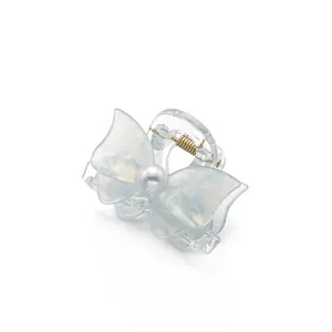 Eleganter schillernder Schmetterling Haarklammer mit Perle und goldener Metallfeder