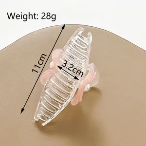 Elegante pinza para el cabello con lazo rosa transparente, perlas blancas y clip de tiburón