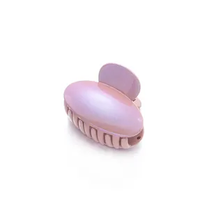Pince à cheveux rose nacré avec paillettes et finition brillante pour cheveux fins