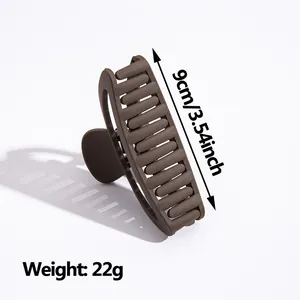 Pince à cheveux mate marron foncé de 9cm avec spécification de poids de 22g
