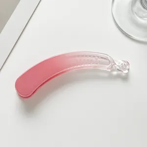 Pink to clear gradient banana hair clip with matte finish and non-slip teeth for high ponytail