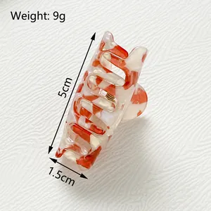 Haarklammer aus Acetat mit orangefarbenem Marmormuster 5cm Länge für Damen und Kinder