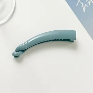 Close-up of duck egg blue banana clip with non-slip teeth for ponytail styling