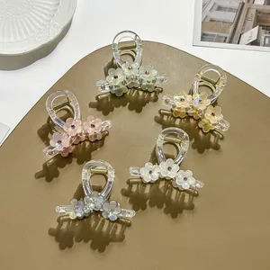 Vijfdelige set bloemen haarklemmen van acryl met strass-steentjes in iriserende pastelkleuren