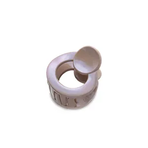 Detailed view of champagne glitter round hair claw clip with 3.5cm diameter design