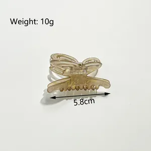 Elegant amber butterfly hair claw clip for women, 5.8cm lightweight resin hair accessory