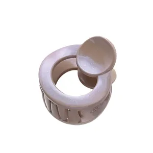 3.5cm mini round hair claw clip with glitter finish and light brown pearlescent resin