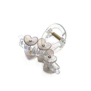 Transparent acrylic heart hair claw clip with mother of pearl texture and crystal diamond