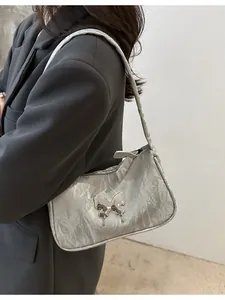 Silver Y2K butterfly shoulder bag in metallic crinkled fabric for women's fashion