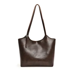 Borsa a secchiello retrò in pelle marrone scuro con spalline lunghe per il pendolarismo