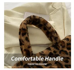 Close-up of leopard print faux fur handbag with a thick soft plush handle design