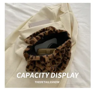Internal view of plush leopard print shoulder bag showing spacious storage for daily items
