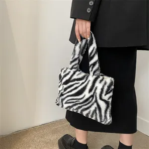 Fashionable zebra print plush handbag with black and white stripes for women
