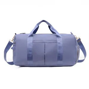 Sac de sport bleu-violet étanche avec doubles poignées et bandoulière amovible