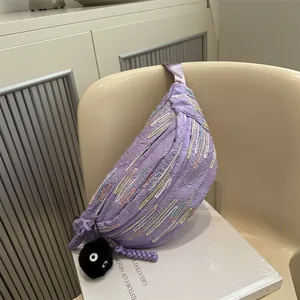 Purple chest bag with pleated texture, colorful embroidery, and plush pendant charm