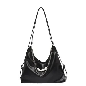 Minimalist black PU leather hobo shoulder bag with elegant silver chain and pearl details