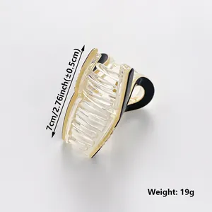 7cm acrylic hair claw clip with black and gold trim, weighs 19g, ideal for half-up hairstyles