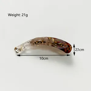 Elegant amber rhinestone banana hair clip for ponytail styling, dimensions 10cm by 2.1cm