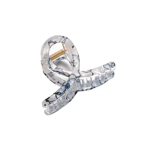 Elegant white and blue marble texture hair claw clip with strong golden spring
