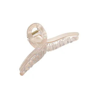 Extra large iridescent champagne hair claw clip with glossy pearlescent finish