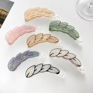 Leaf-shaped banana hair clips in multiple iridescent colors for long hair styling