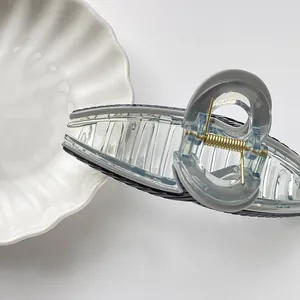 Minimalistische 13cm Haarklammer für dickes Haar mit Goldfeder und grauem Acryl-Design