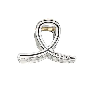 Pince à cheveux élégante en argent avec strass et design croisé pour filles et enfants