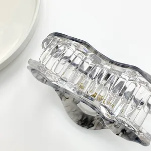 Pinza para el pelo nube con textura de mármol negro para peinado elegante de mujer