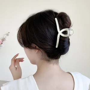 Elegant cream resin hair claw clip with French lettering for women's daily styling