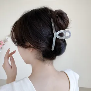 Large marble pattern hair claw clip with elegant acetate texture for hair styling