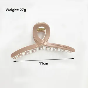 Large khaki matte shark hair clip with Barrette La France text for stylish women