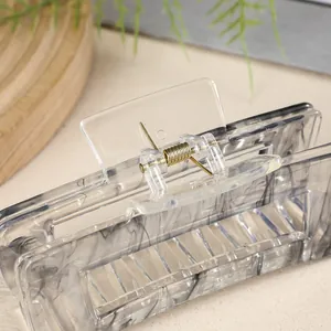 Elegant rectangle hair claw clip with ink marble texture and golden metal spring