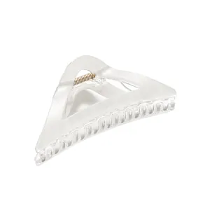 Geometric hollow triangle hair claw clip with elegant marble texture and metal spring