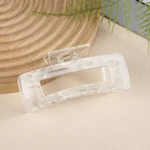 Minimalist marble pattern square hair claw clip in translucent acrylic finish