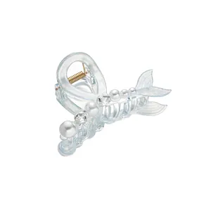 Pince à cheveux queue de poisson élégante avec perles et strass sur base claire