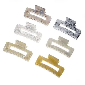 Set of 6 medium rectangle acetate hair claws with marble and checkerboard patterns