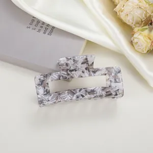 Detail of 8cm medium acetate hair claw clip with grey marble texture and hollow square design