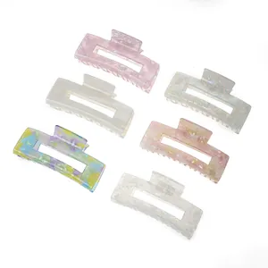Set di sei mollette quadrate in acetato con trame marmorizzate e floreali multicolore