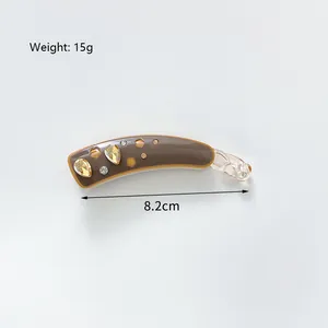 Pince à cheveux banane avec strass et motif floral pour queue de cheval haute élégante