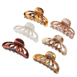 Set di sei eleganti fermagli per capelli in acetato con motivi marmorei e tartaruga