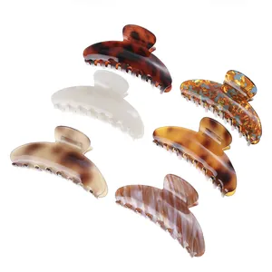 Set of 6 large leopard print hair claw clips in tortoiseshell and marble patterns