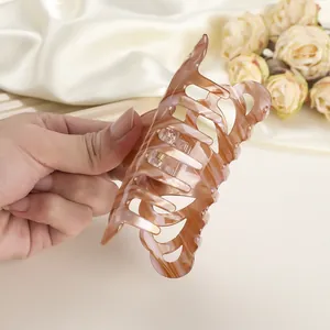 Elegant large marble patterned hair claw clip with tortoise shell finish for women