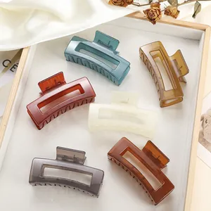 Set of 6 square jelly resin hair claw clips in various colors displayed on a wooden tray