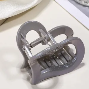 Elegante molletta per capelli a cuore in resina viola scintillante con molla metallica