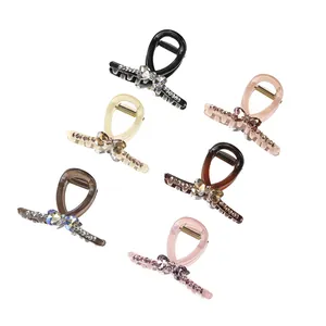 Set de 6 pinzas para el cabello con diseño cruzado y lazo de strass para peinado elegante