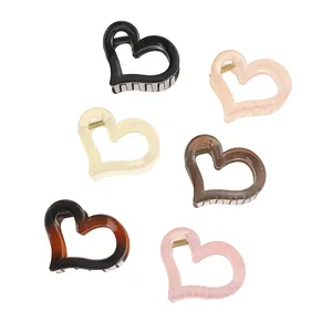 Set di sei mollette per capelli a forma di cuore in acrilico ecologico per donna