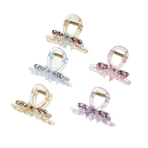 Set de cinco pinzas florales con purpurina en color champán azul rosa amarillo lila