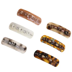 Acetate hair clips in 6 colors with 3D flower embellishments and crystal accents