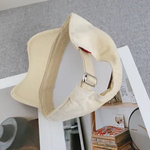 Beige cotton baseball cap with letter embroidery and adjustable metal buckle strap